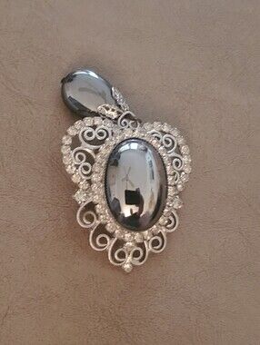 Silver-Tone Hematite Oval Brooch With Crystal Accents